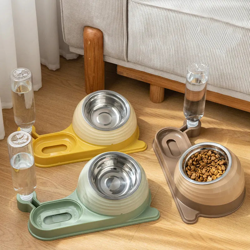 Brown elevated cat bowl with attached water bottle dispenser on a white background