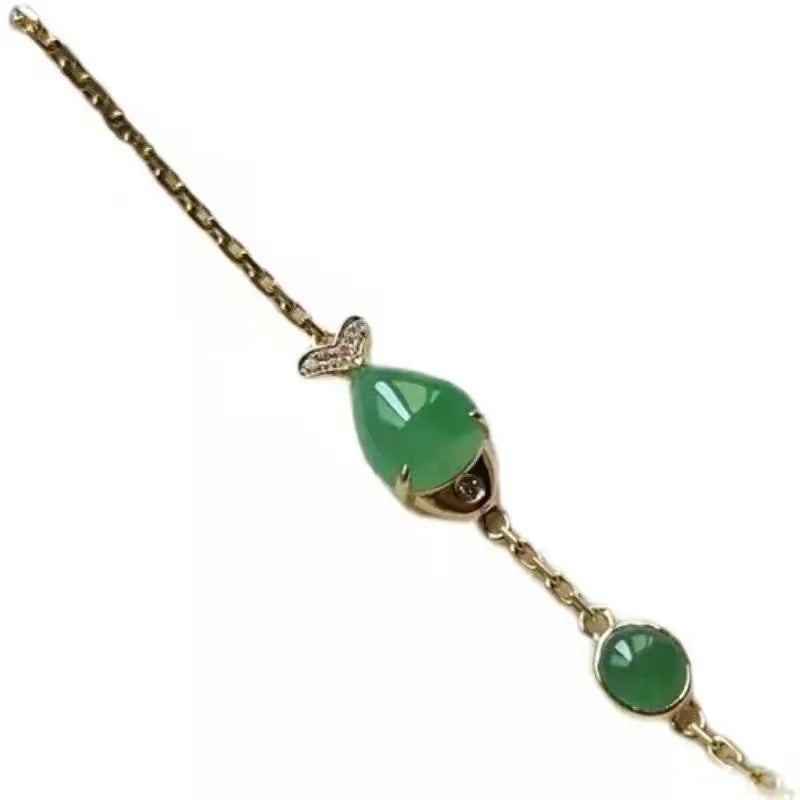 Retro style electroplated yellow gold bracelet made from copper and plastic materials.