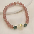 Strawberry quartz and blue water emerald pendant bracelet with round jade centrepiece and geometric diamond elements