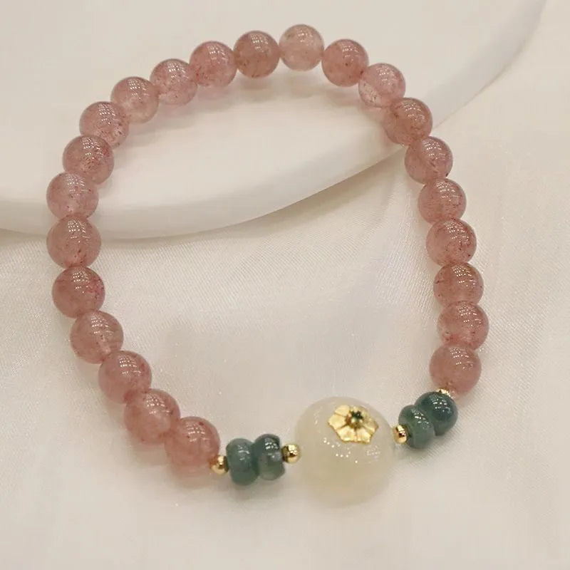 Strawberry quartz and blue water emerald pendant bracelet with round jade centrepiece and geometric diamond elements