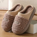 Men's grey and brown plaid cotton slippers with thick sole and woolly lining.