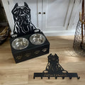 Personalised dog bowl holder with stainless steel dish and cast iron dog head, showing custom name engraving.