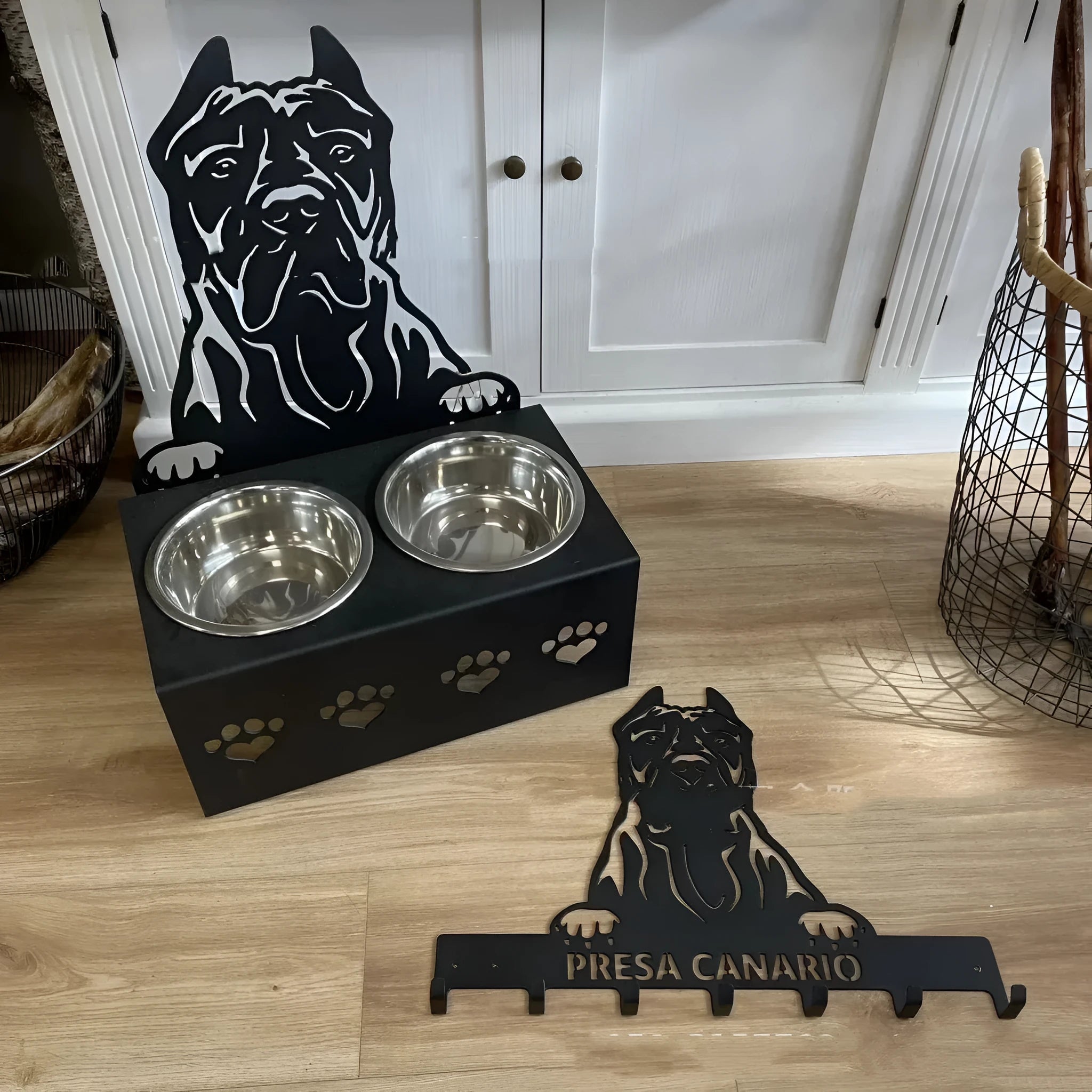 Personalised dog bowl holder with stainless steel dish and cast iron dog head, showing custom name engraving.