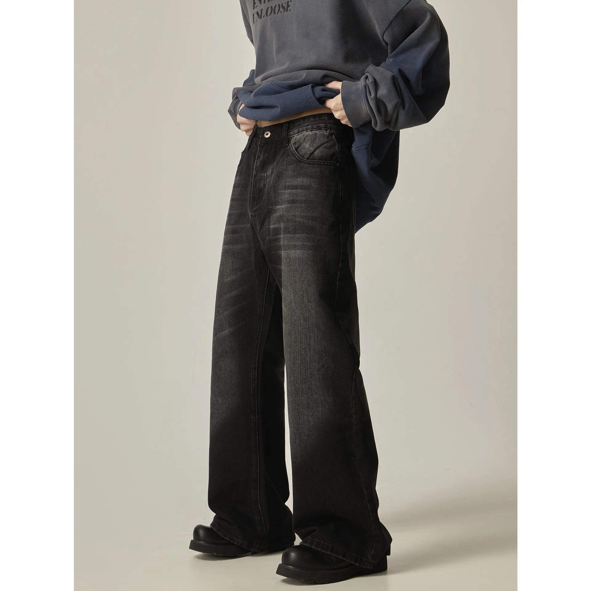 Black loose straight leg jeans with American retro styling and zipper fly