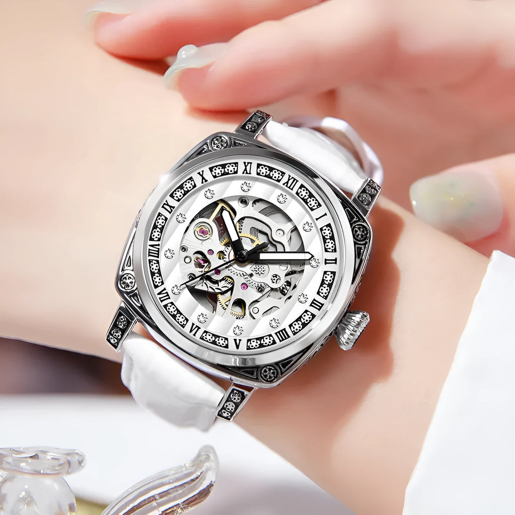 Mechanical wristwatch with luminous hands on leather strap in choice of colours