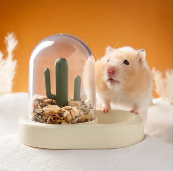 Transparent automatic hamster feeder with 190ml grain capacity in mint green colour