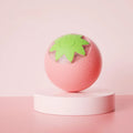 Automatic electric rolling ball pet toy for dogs and cats, 4.5cm cube in green, pink, or yellow.