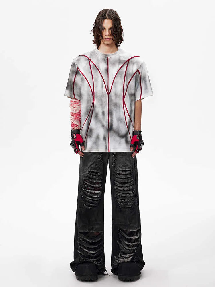 Women's short sleeve t-shirt with padded shoulders and three-dimensional line patchwork design on a round neck.