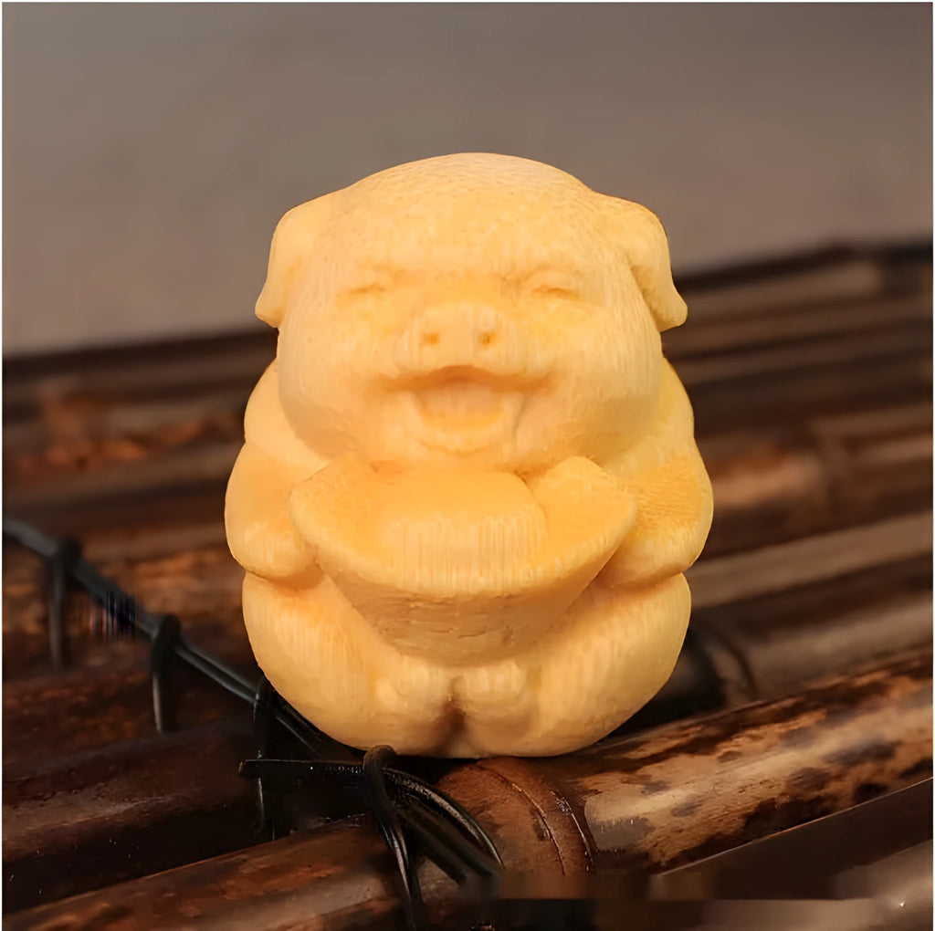 Solid bamboo pig carving ornament measuring 4cm height with 3.5cm diameter ingot shape