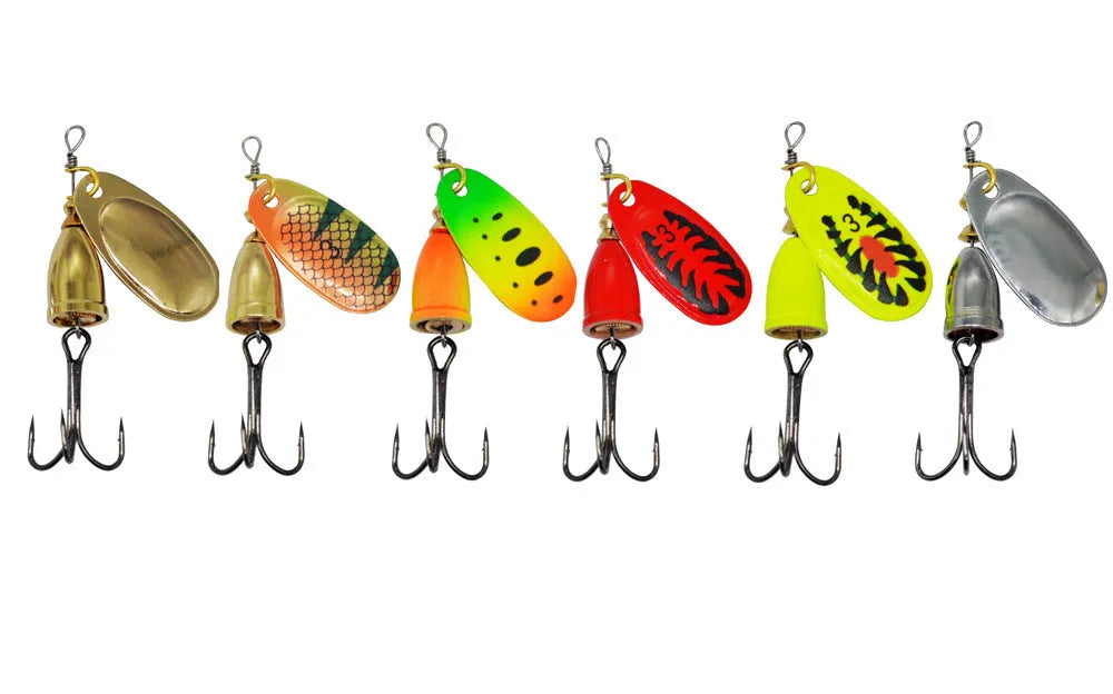 R composite rotating sequins copper bell metal fishing lure in multiple colour options on a blue background
