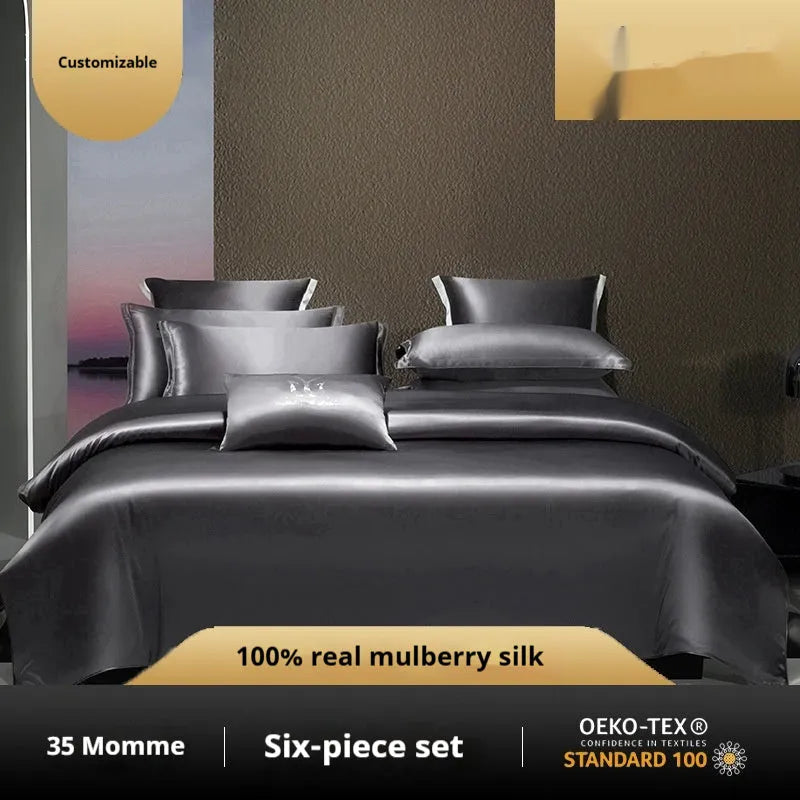 Solid colour silk quilt cover set with pillowcases on a bed, shown in a light luxury style.