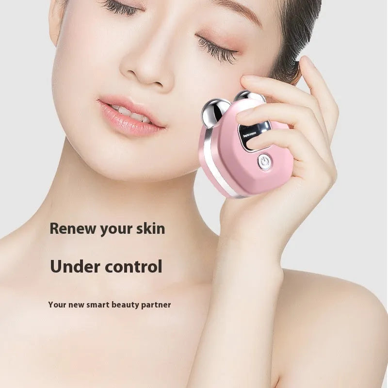 Portable hot compress micro current massage instrument in white, light blue, or pink colours with double-roller design