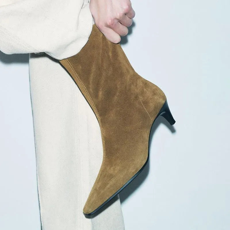 Women's brown square toe ankle boots with a side zipper and a mid kitten heel on a waterproof platform.