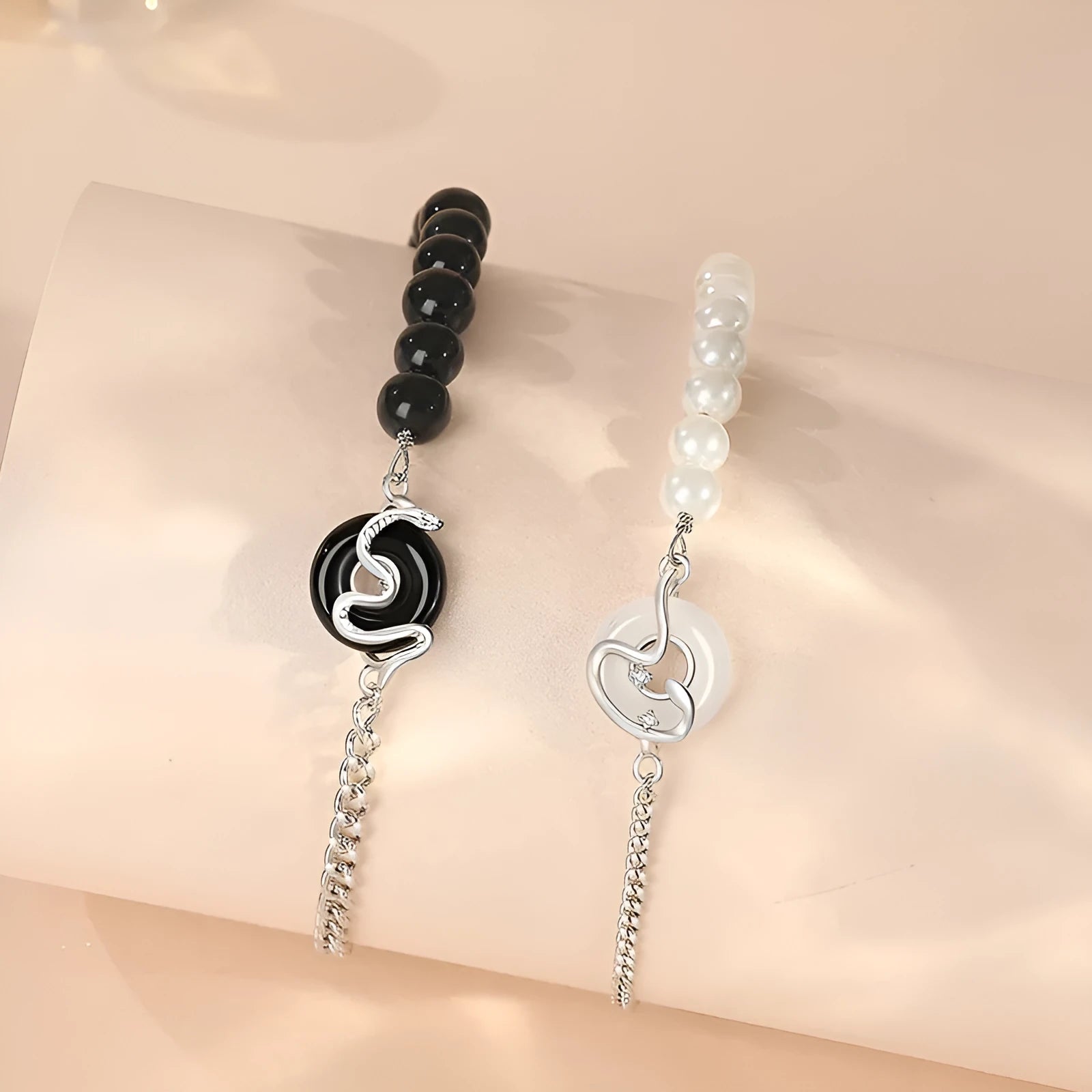 925 sterling silver bracelet with obsidian pearl, snake design, and safe buckle in New Chinese style.