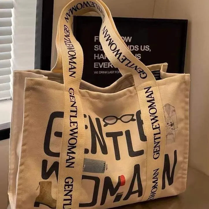 Canvas women's tote bag with printed pattern and shoulder strap design