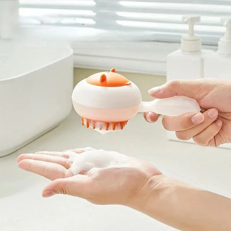 Blue and orange automatic cleaning pet bath brush with soft gel massage pads for wet or dry grooming