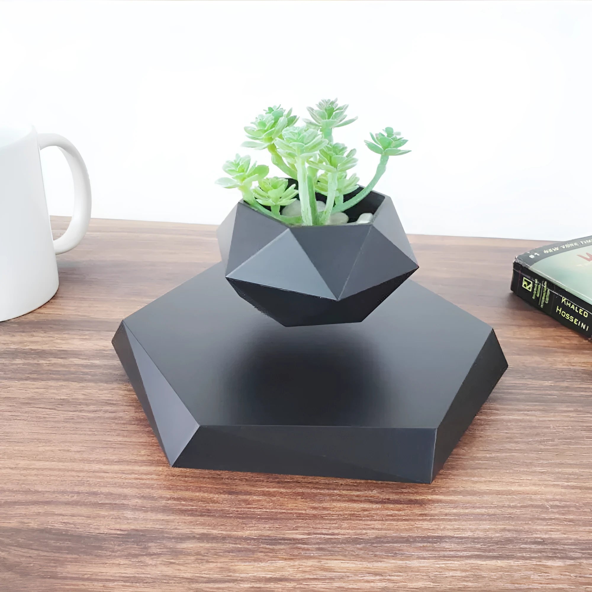 Hexagonal wood grain magnetic levitating flower pot floating above matching base