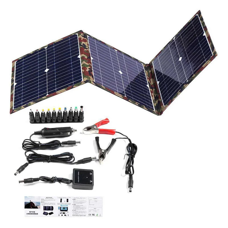 Black foldable portable 36W solar panel unfolded with connected cables and accessories