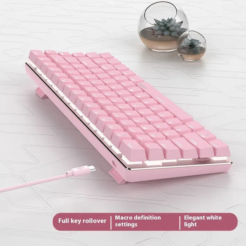 Pink mechanical gaming keyboard with white backlight showing 82-key layout