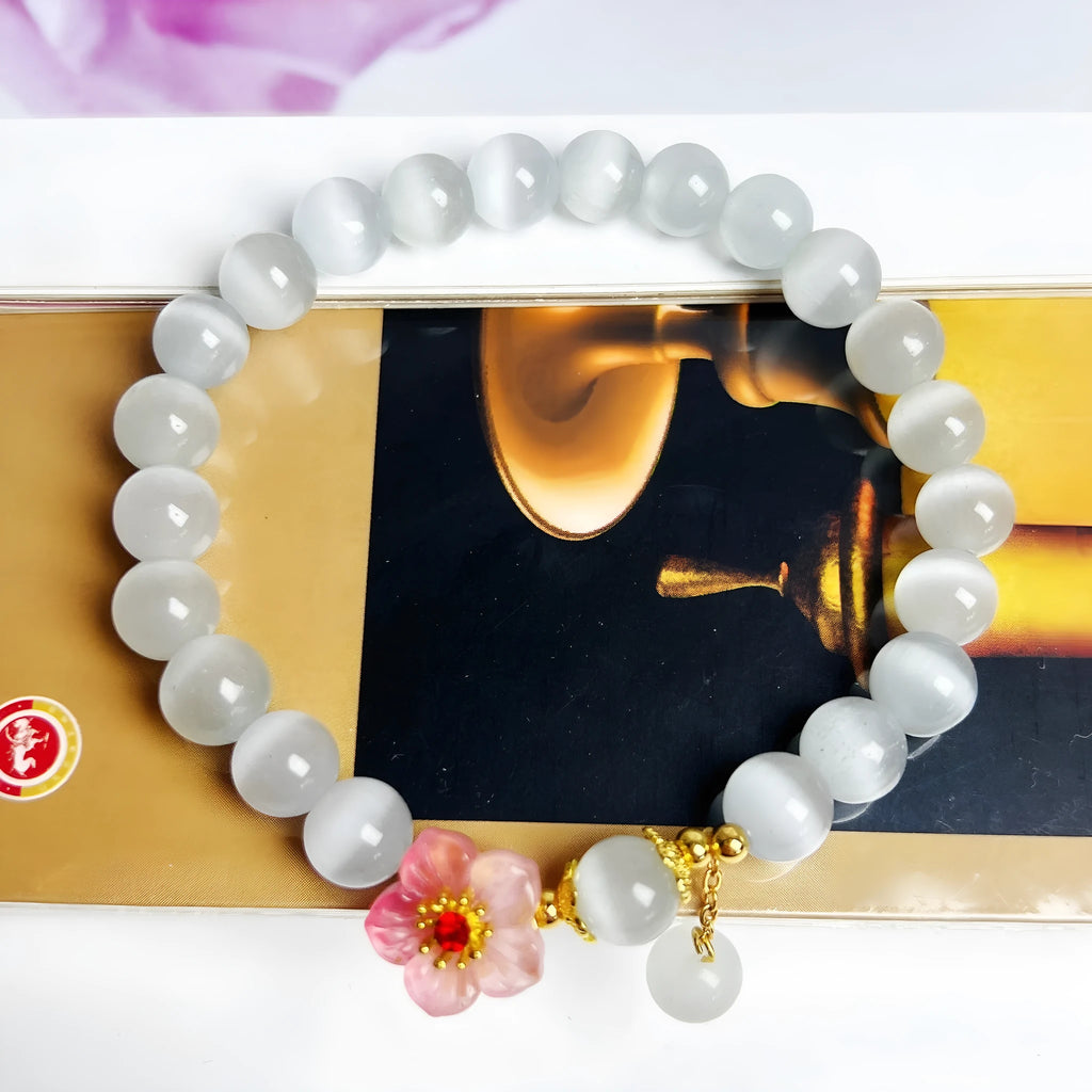 White opal flower beaded bracelet with manual glass and coloured glaze construction