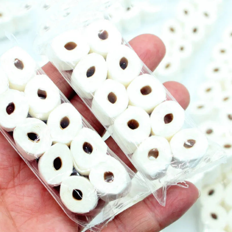 Miniature simulated toilet paper roll toy model for dollhouses, made of paper.