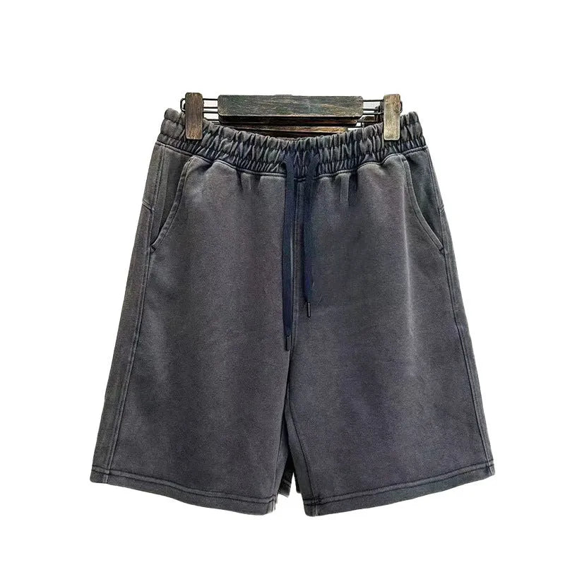 Men's cotton casual shorts with distressed detailing in straight leg loose fit showing navy blue colour option