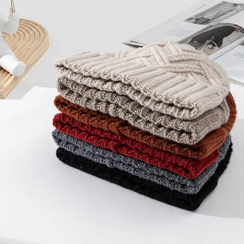 Wool knitted dome beanie hat in six colour options showing ivory white, khaki, red, brown, gray, and black variations