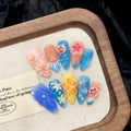 Plastic wearable armour with 3D carved jellyfish design in marine style, almond nail colour