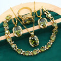 Olive green and red zircon jewellery set for women featuring a necklace with snake bone chain, matching earrings, and a ring.