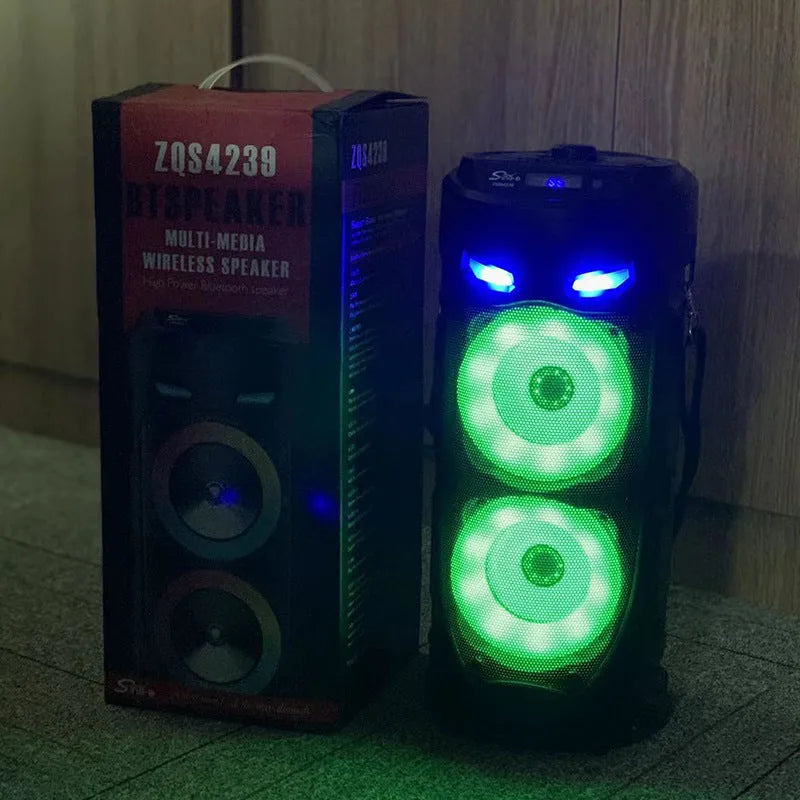Black portable Bluetooth speaker with dual horn design and wheat aesthetic details