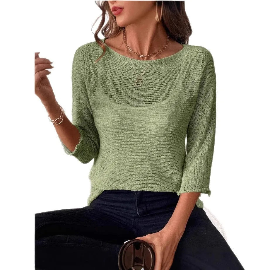 Women's off-shoulder knitted jumper in light blue with a 3D pattern and 3/4 sleeves.