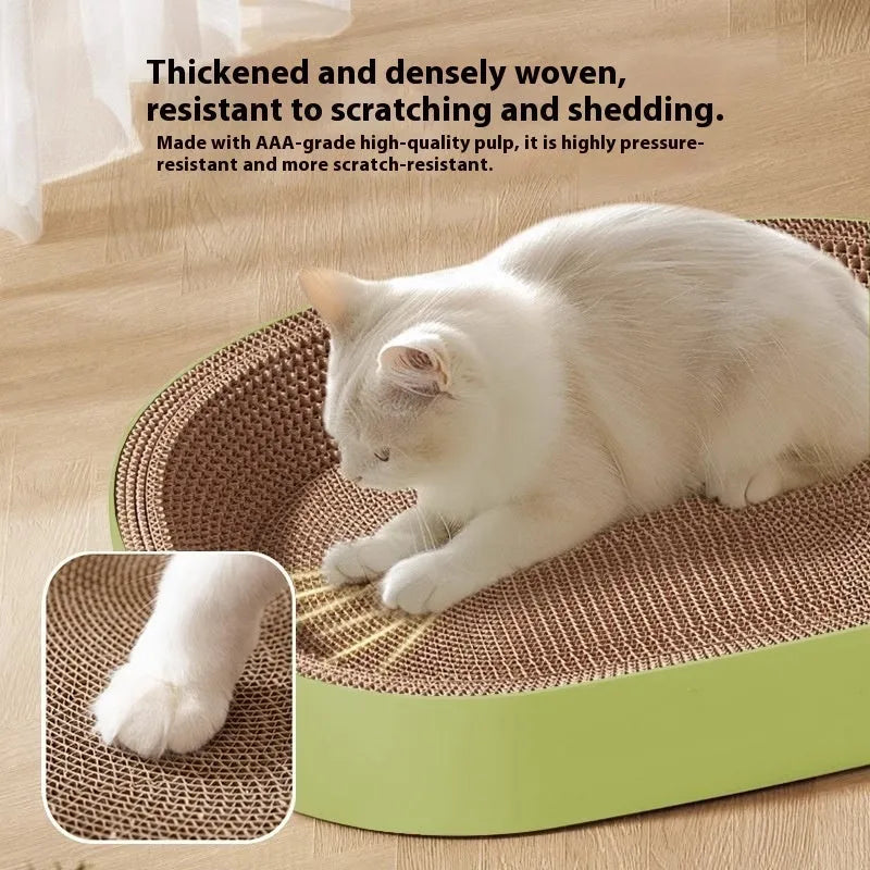 Green oval corrugated paper cat scratch board and nest bed for cats on a wooden floor.