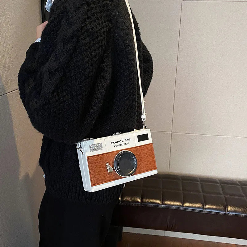 Mini PU crossbody camera bag in black with chain strap, horizontal square shape