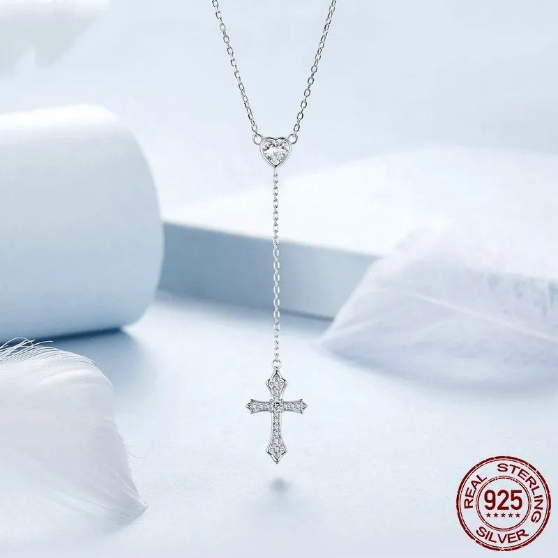 Silver love cross necklace on an O-ring chain with a V-neck design, colour BSN384.