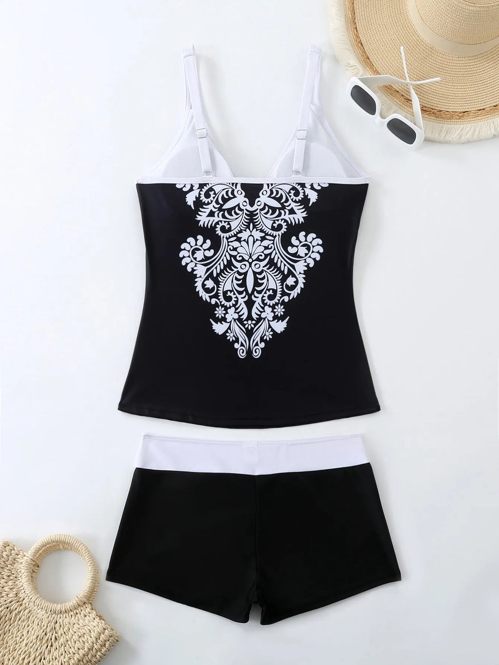 Plus size women's two-piece swimsuit briefs in black or rose red, made from polyester with cotton lining.