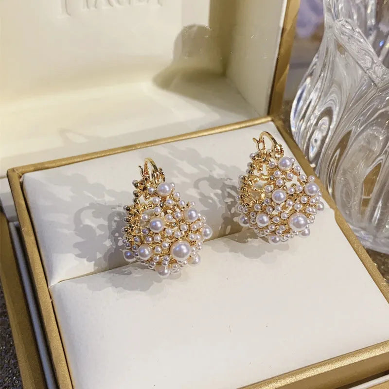 Gold copper flower basket earrings with pearl inlay and small rice-shaped beads