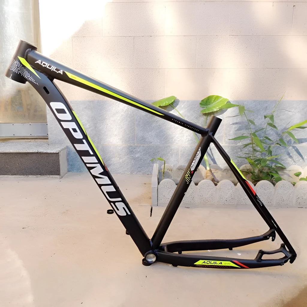 Black green aluminium mountain bike frame for 29-inch wheels with inner cable routing and disc brake mounts.