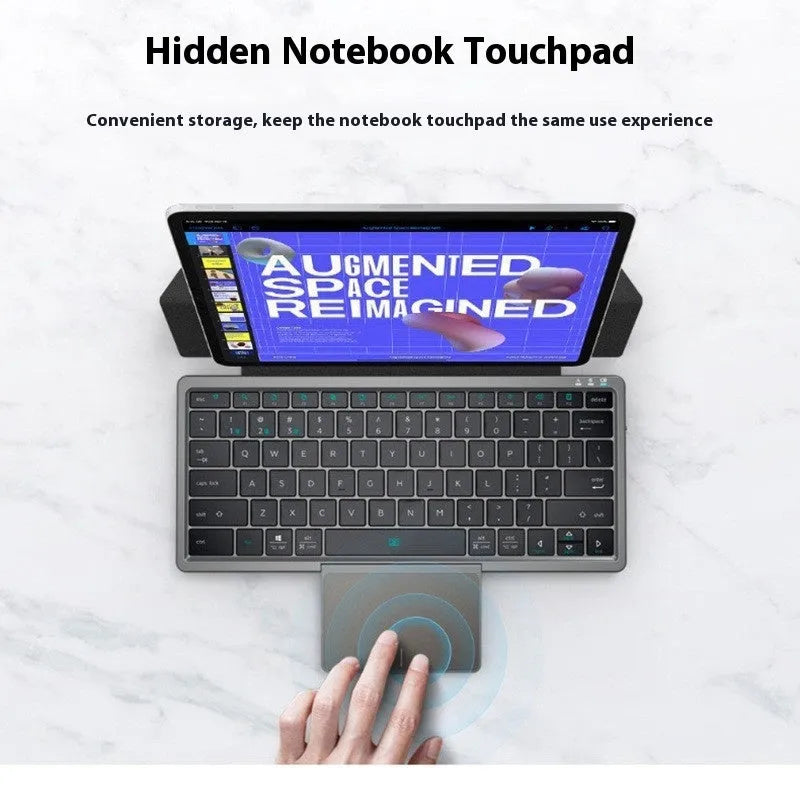 Black and grey wireless Bluetooth keyboard with touch pad next to its leather sheath stand for a tablet.