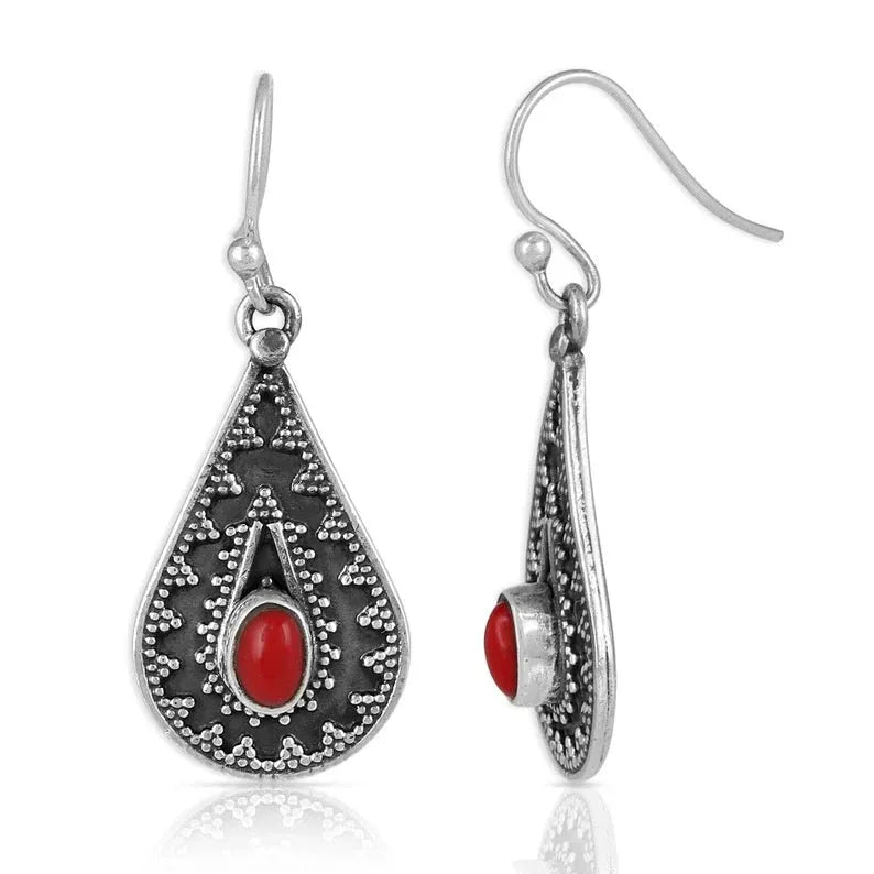 Silver drop-shaped retro earrings for women with red pine gemstone details on zinc alloy.