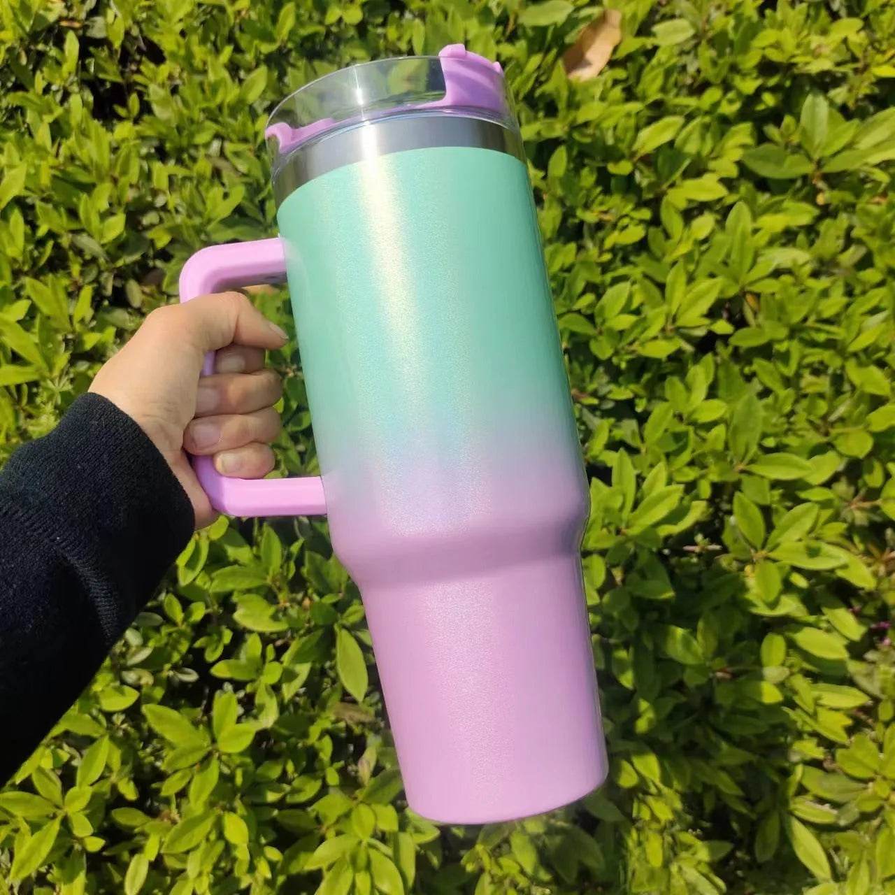 Large stainless steel vacuum insulation cup in a gradient colour, showing double-wall construction and 27.5cm height.
