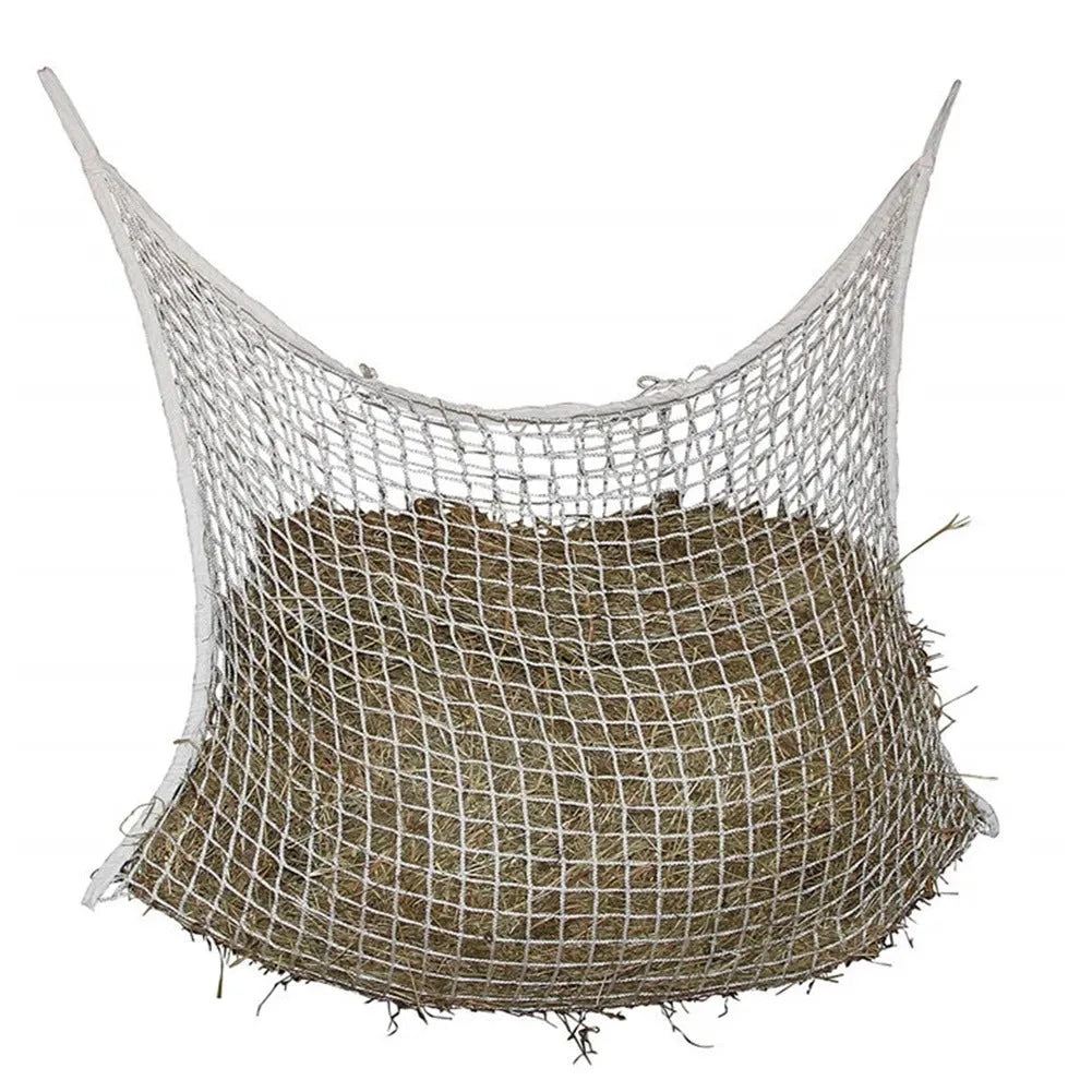 Woven grid horse feeding bag in black hanging, suitable for cattle and sheep.