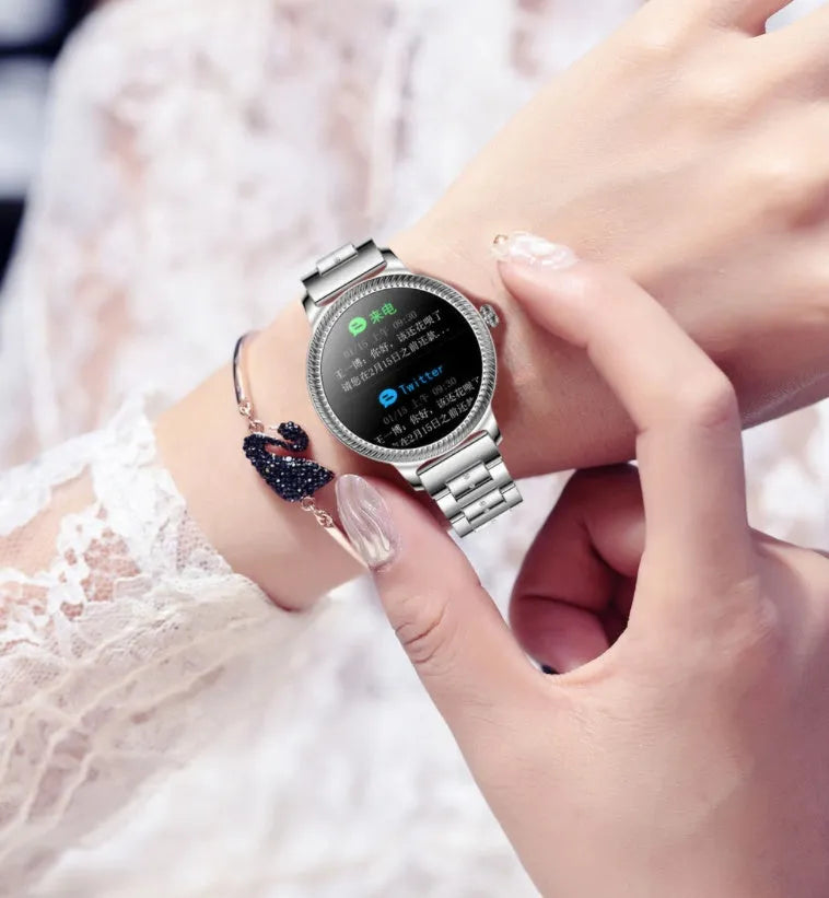 AK38 ladies smart watch with stainless steel band and 1.09-inch colour screen.