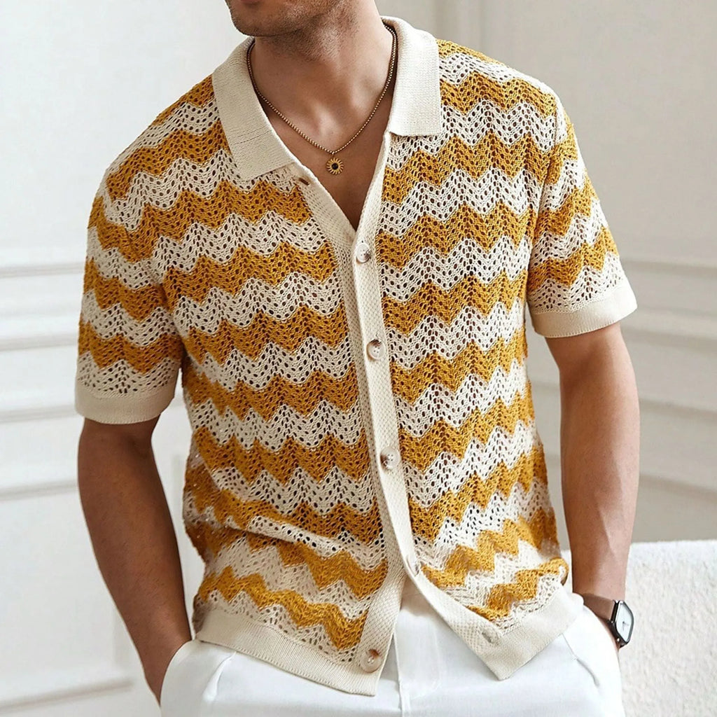Short sleeve corrugated Tencel sweater with a blue hollow jacquard texture on a hanger.