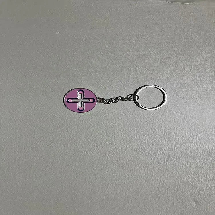 Colourful pendant keychain made of zinc alloy in eight colour options including black, blue, green, pink, purple, red, sky blue, yellow.