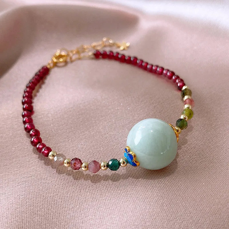 Garnet-coloured tourmaline drop bracelet in electroplated setting for women.