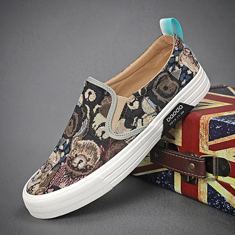 Canvas slip-on sneakers in khaki, grey green, or black with vulcanised rubber sole.