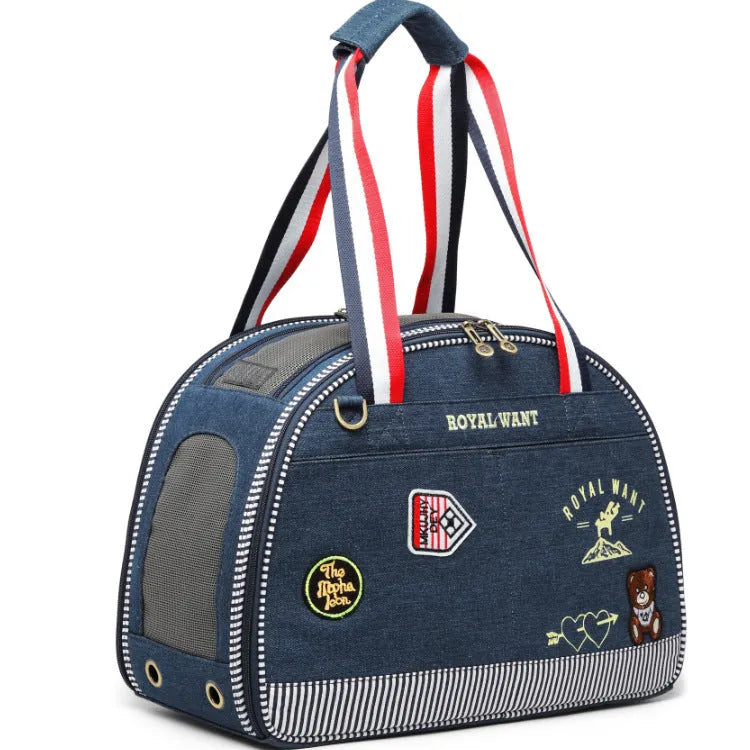Blue denim pet diaper bag with cartoon print, dimensions 43x20x30cm.