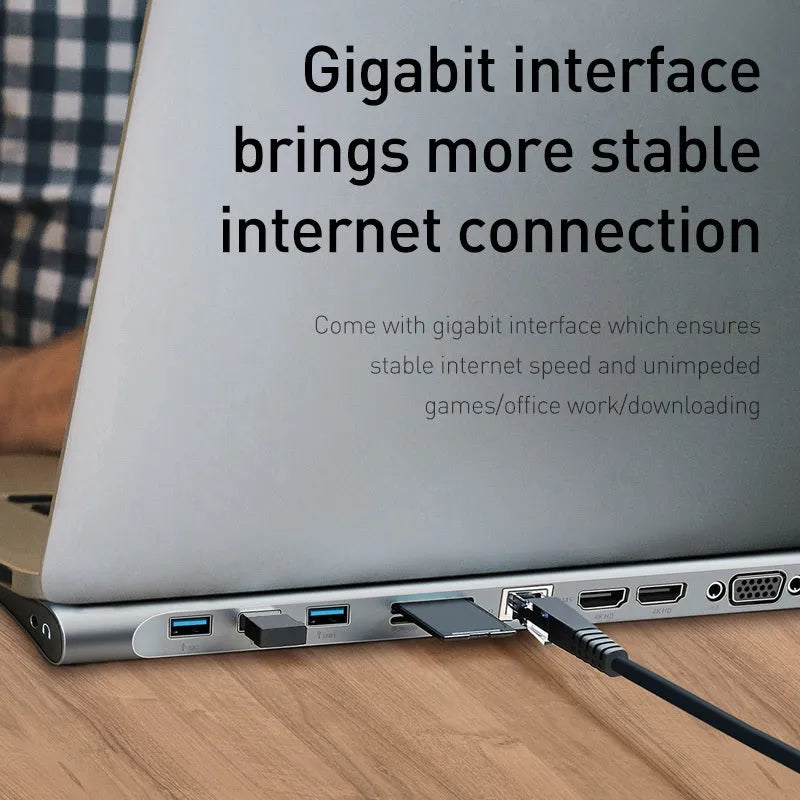 Grey 10-port USB-C docking station with aluminium cooling bracket showing HDMI, VGA, and Ethernet ports