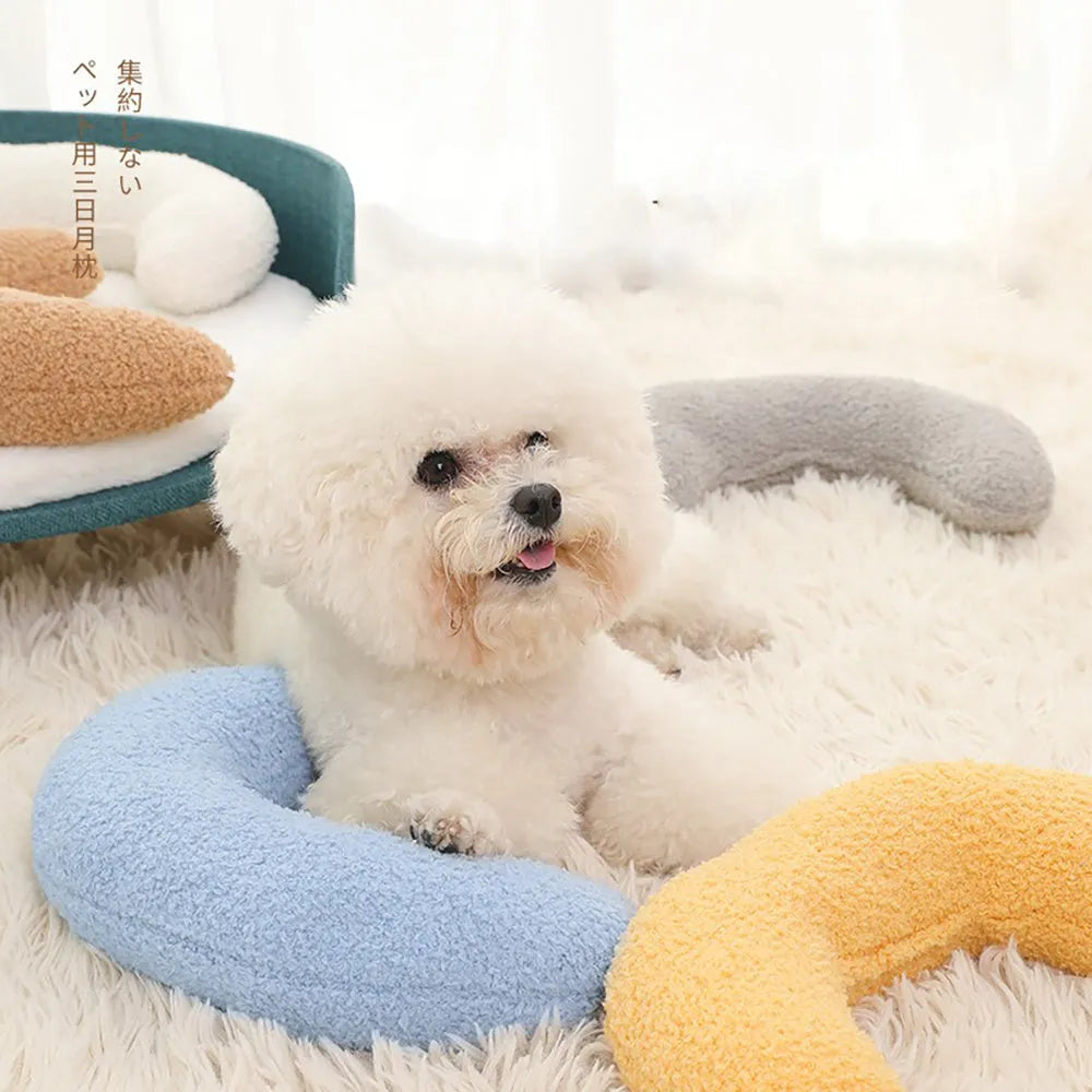 U-shaped blue cat pillow with adjustable neck collar on sofa