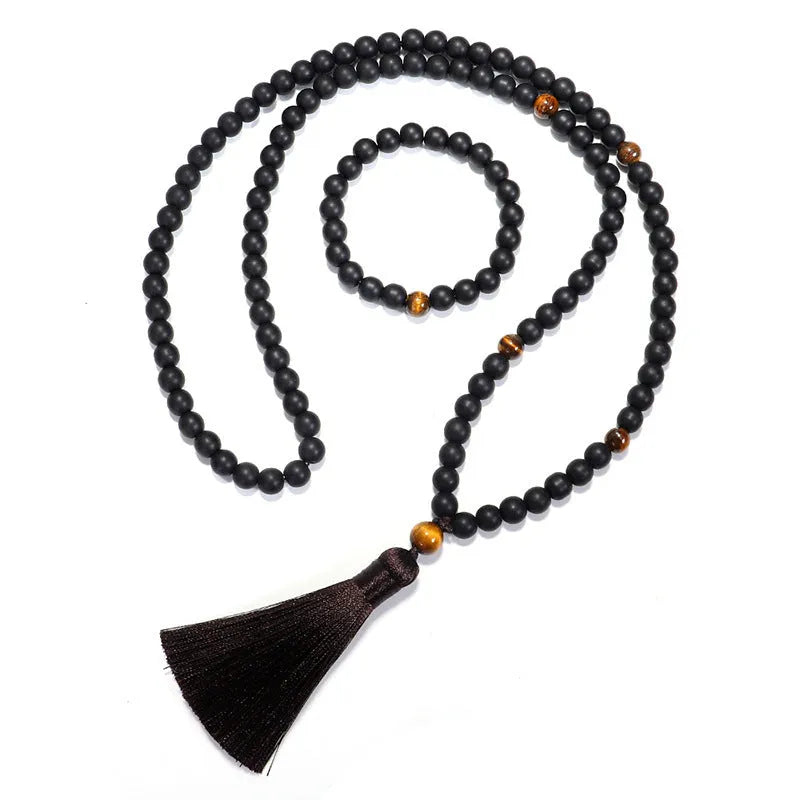 Tigereye stone drop pendant with tassel on long beaded necklace with matching bracelet.